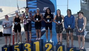 Emma Hussein placing 2nd at a college swim event